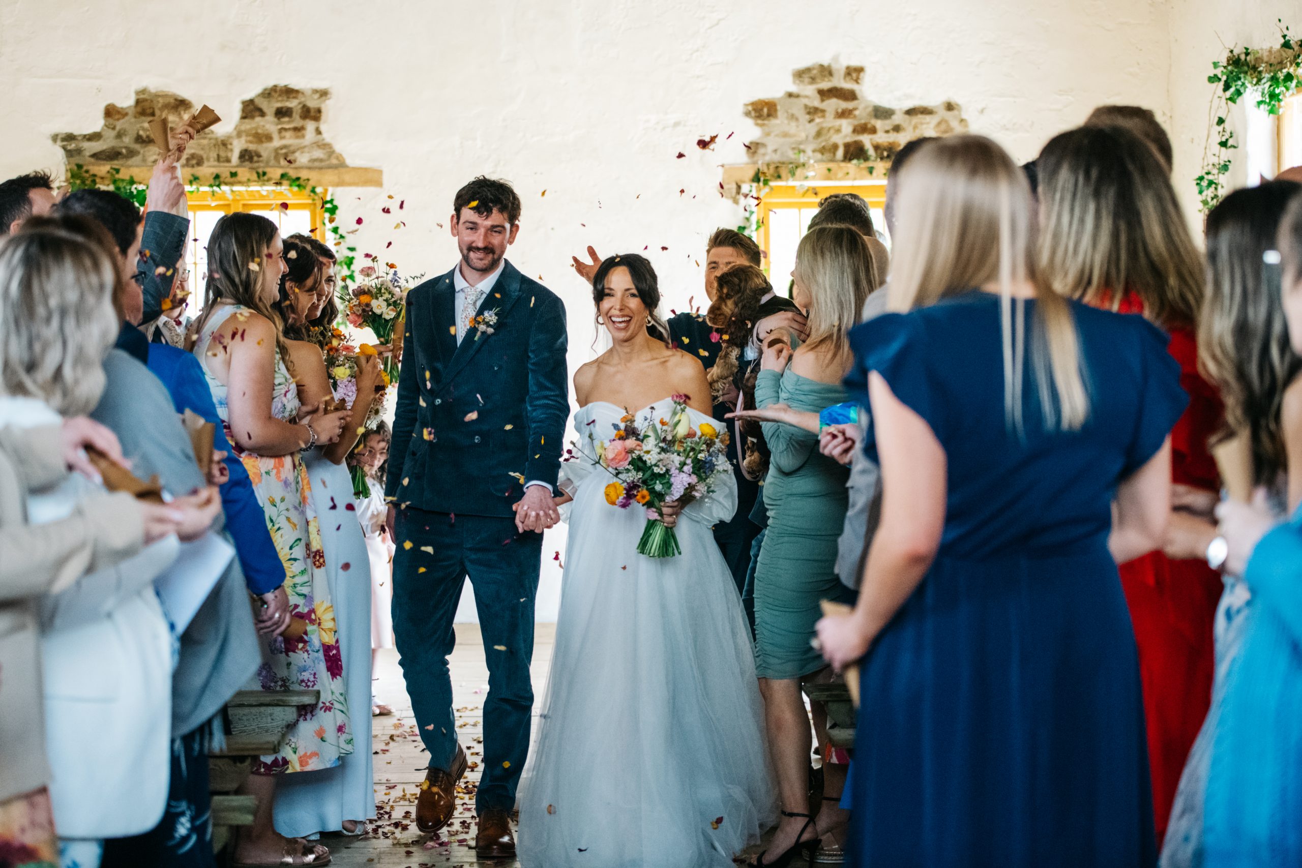 Saffron & Elliot’s colourful early Spring Wedding with one very cute pooch!